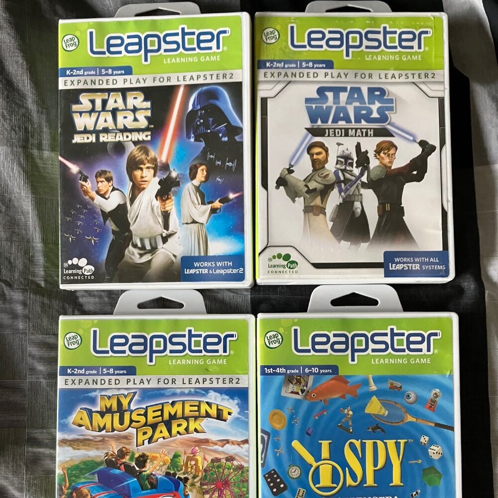 Leap Frog Leapster Learning Games - 4 pack with cases & booklets - Used